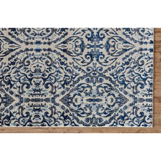 Blue Ivory And Black Floral Distressed Stain Resistant Area Rug Photo 4