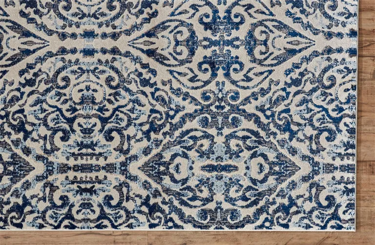 Blue Ivory And Black Floral Distressed Stain Resistant Area Rug Photo 4