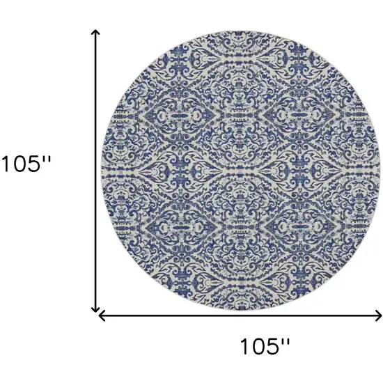 Blue Ivory And Black Round Floral Distressed Stain Resistant Area Rug Photo 4