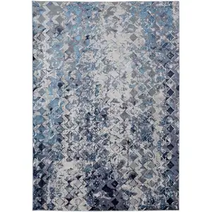 Photo of Blue Ivory And Gray Geometric Power Loom Distressed Area Rug