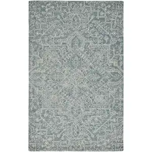 Photo of Blue Ivory And Green Wool Floral Tufted Handmade Stain Resistant Area Rug