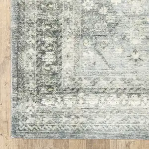 Photo of Blue Ivory And Grey Oriental Power Loom Stain Resistant Area Rug