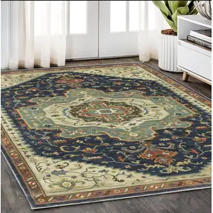 Photo of Blue Ivory And Orange Oriental Area Rug With Fringe