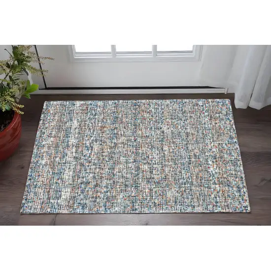 Blue Ivory And Orange Plaid Tufted Handmade Area Rug Photo 1