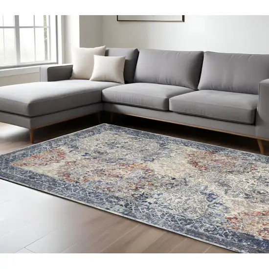 Blue and Ivory Floral Power Loom Distressed Non Skid Area Rug Photo 1