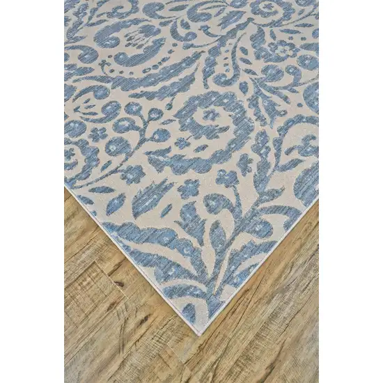 Blue Ivory And Tan Floral Distressed Stain Resistant Area Rug Photo 4