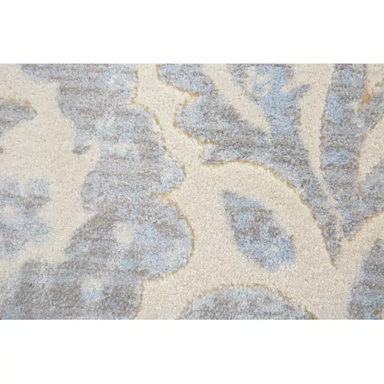 Blue Ivory And Tan Floral Distressed Stain Resistant Area Rug Photo 8