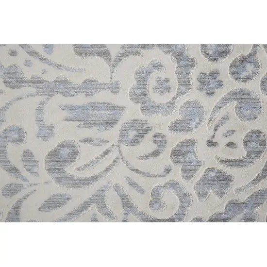 Blue Ivory And Tan Floral Distressed Stain Resistant Area Rug Photo 6