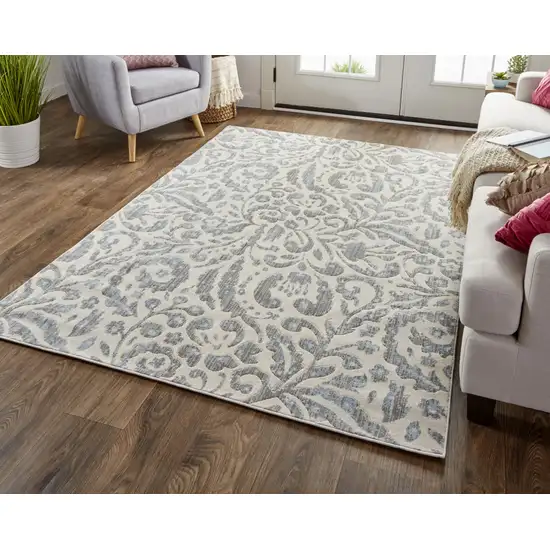 Blue Ivory And Tan Floral Distressed Stain Resistant Area Rug Photo 5