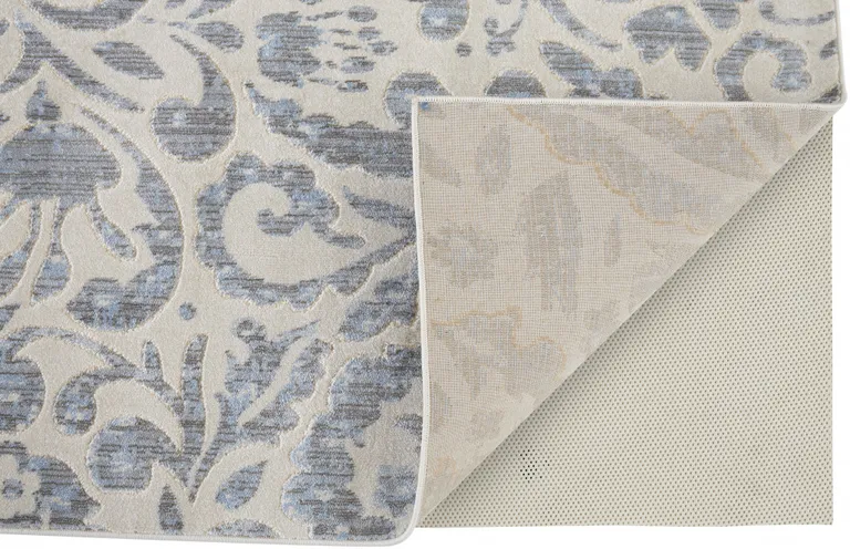 Blue Ivory And Tan Floral Distressed Stain Resistant Area Rug Photo 3