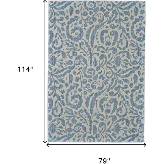 Blue Ivory And Tan Floral Distressed Stain Resistant Area Rug Photo 10