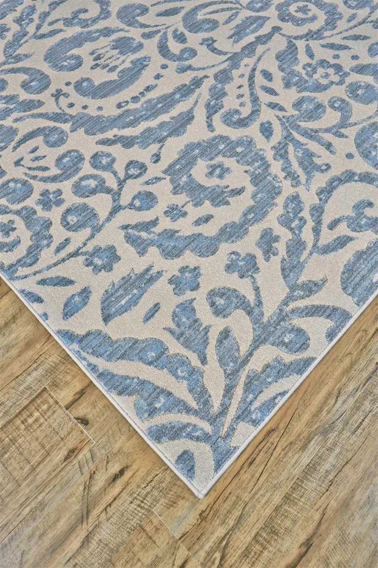 Blue Ivory And Tan Floral Distressed Stain Resistant Area Rug Photo 4