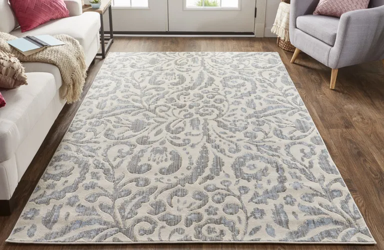 Blue Ivory And Tan Floral Distressed Stain Resistant Area Rug Photo 4