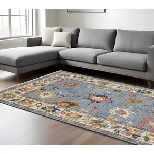 Photo of Blue Ivory And Yellow Oriental Area Rug With Fringe