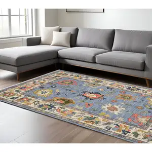 Photo of Blue Ivory And Yellow Oriental Area Rug With Fringe