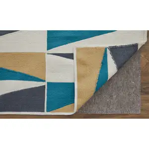 Photo of Blue Ivory and Gold Geometric Power Loom Area Rug