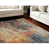 Photo of Blue Ivory and Orange Abstract Non Skid Area Rug