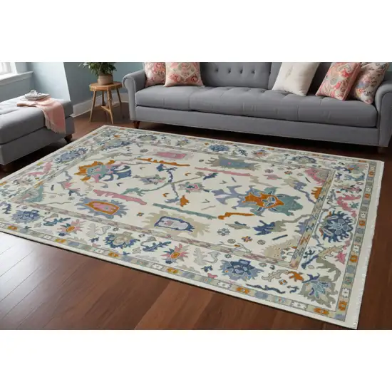 Blue Ivory and Pink Wool Floral Hand Knotted Area Rug With Fringe Photo 1