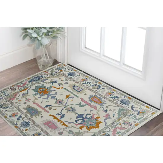 Blue Ivory and Pink Wool Floral Hand Knotted Area Rug With Fringe Photo 1