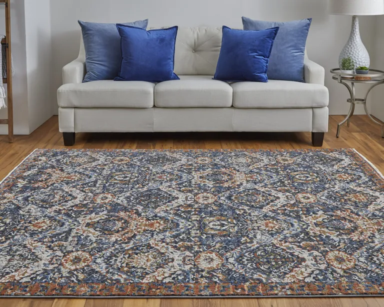 Blue Orange And Ivory Floral Power Loom Area Rug With Fringe Photo 1