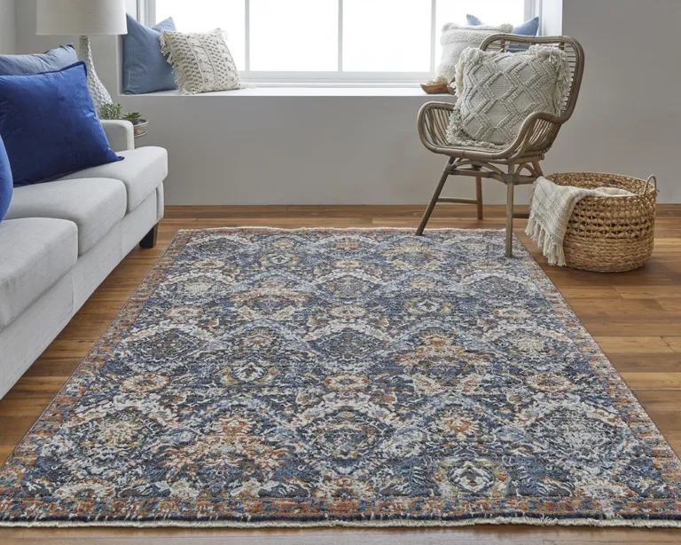 Blue Orange And Ivory Floral Power Loom Area Rug With Fringe Photo 3