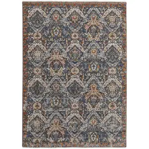 Photo of Blue Orange And Ivory Floral Power Loom Area Rug With Fringe