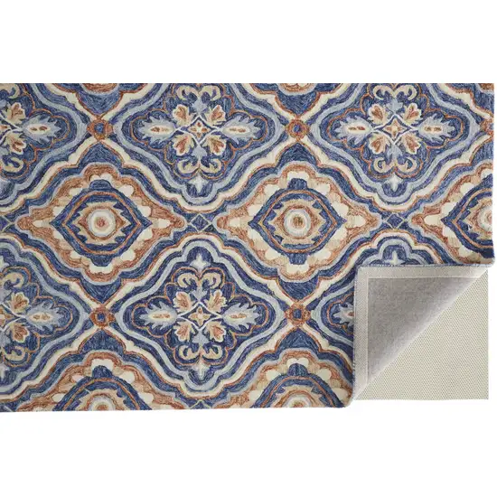 Blue Orange And Ivory Wool Floral Tufted Handmade Stain Resistant Area Rug Photo 3