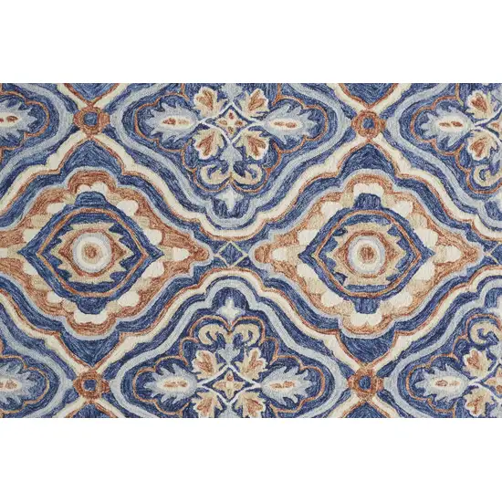 Blue Orange And Ivory Wool Floral Tufted Handmade Stain Resistant Area Rug Photo 9