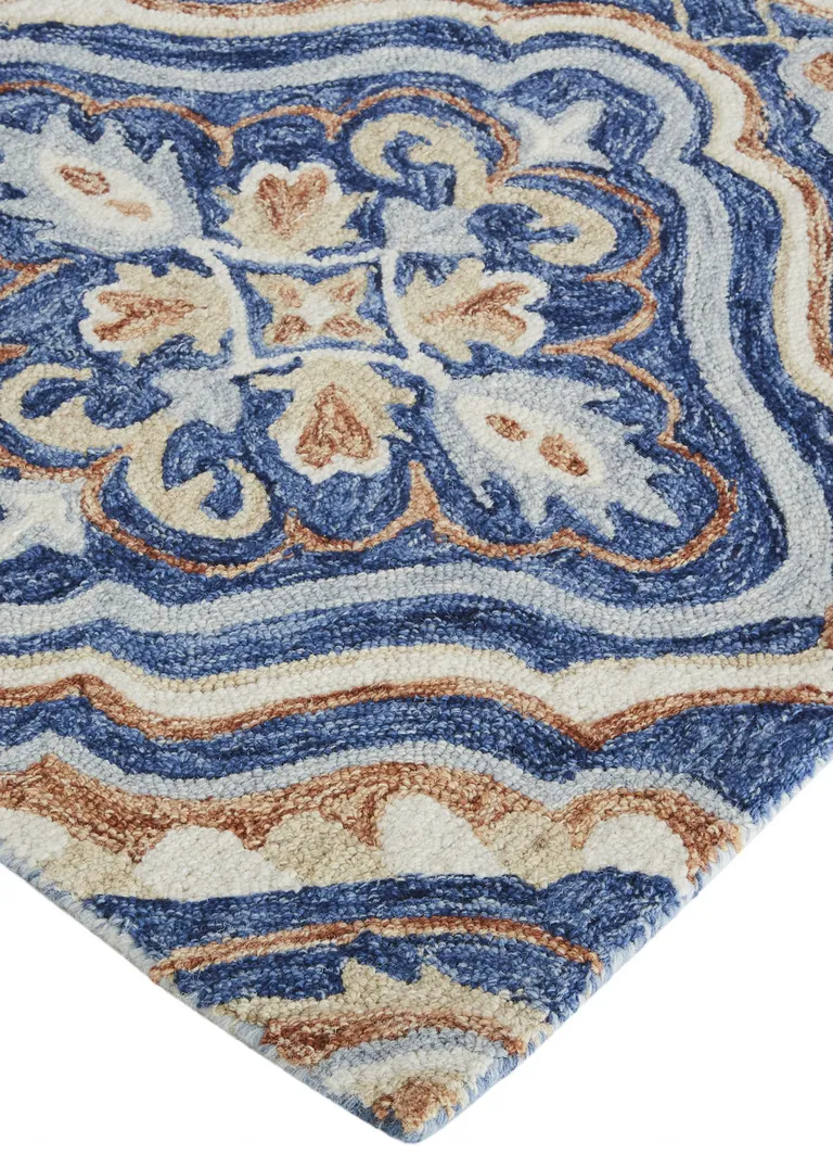 Blue Orange And Ivory Wool Floral Tufted Handmade Stain Resistant Area Rug Photo 4