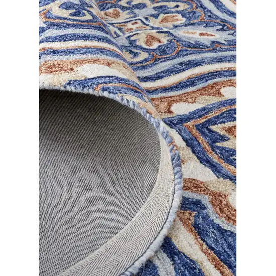 Blue Orange And Ivory Wool Floral Tufted Handmade Stain Resistant Area Rug Photo 5