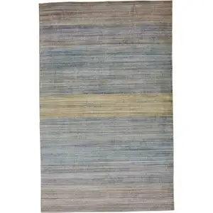 Photo of Blue Purple And Tan Ombre Hand Woven Area Rug