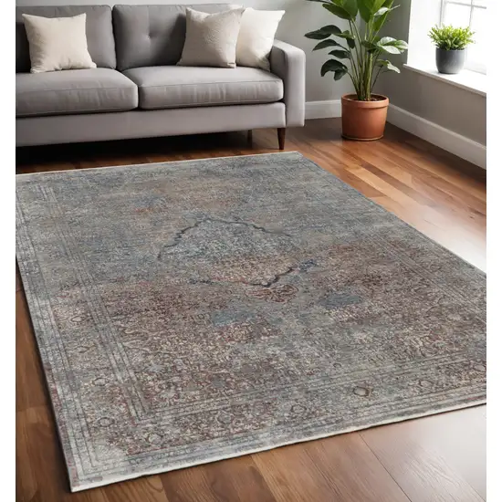 Blue and Gray Floral Power Loom Area Rug Photo 1