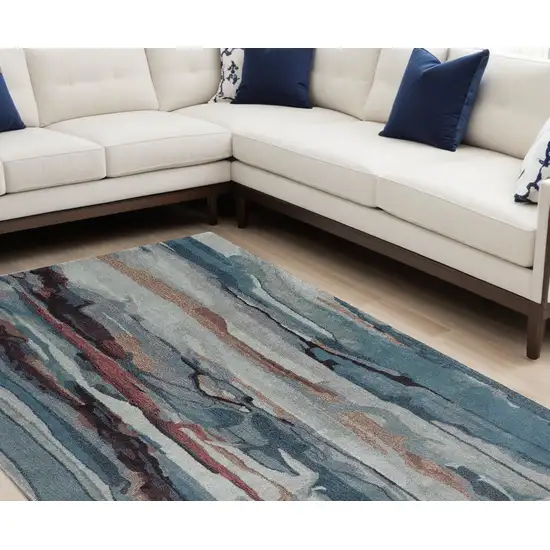 Blue Red And Ivory Wool Abstract Tufted Handmade Stain Resistant Area Rug Photo 1