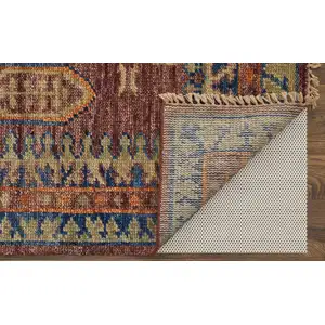 Photo of Blue Red and Tan Wool Geometric Hand Knotted Area Rug With Fringe