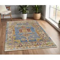 Photo of Blue Red and Yellow Wool Geometric Hand Knotted Area Rug With Fringe