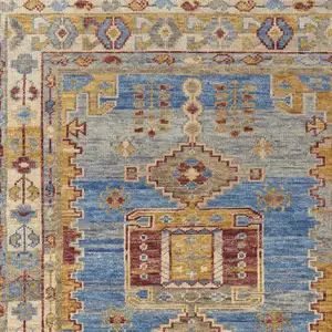 Photo of Blue Red and Yellow Wool Geometric Hand Knotted Area Rug With Fringe