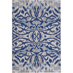 Photo of Blue Taupe And Ivory Ikat Distressed Area Rug