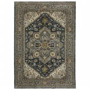 Photo of Blue Taupe Grey Green Rust Tan Beige And Gold Oriental Power Loom Stain Resistant Area Rug With Fringe