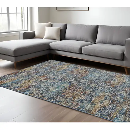 8' X 10' Blue Teal Gold Rust And Beige Abstract Power Loom Stain Resistant Area Rug Photo 1