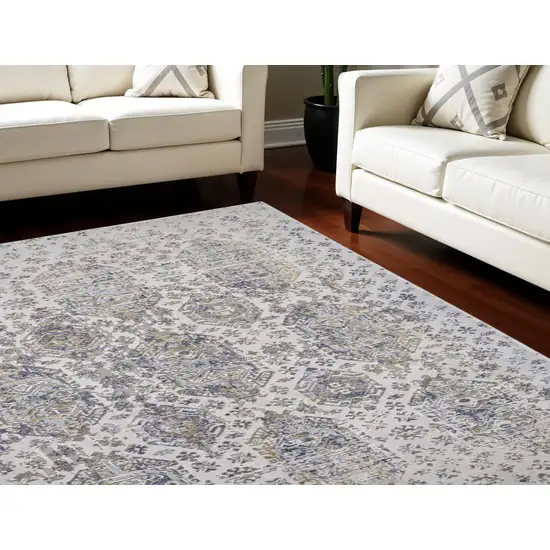 Blue White and Gray Oriental Power Loom Worn Faded Area Rug Photo 1