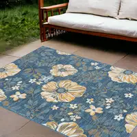 Photo of Blue White and Yellow Floral Stain Resistant Indoor Outdoor Area Rug