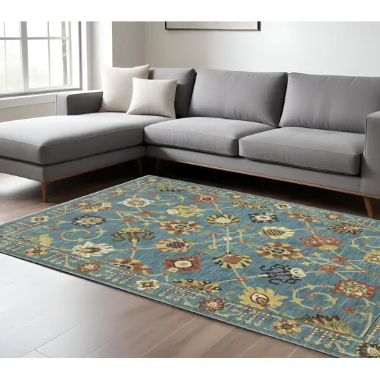 Blue Yellow And Ivory Oriental Area Rug With Fringe Photo 1