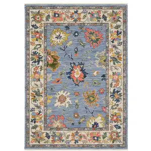 Photo of Blue Yellow And Ivory Oriental Area Rug With Fringe