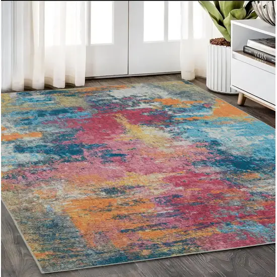 Blue Yellow And Red Abstract Distressed Area Rug Photo 1