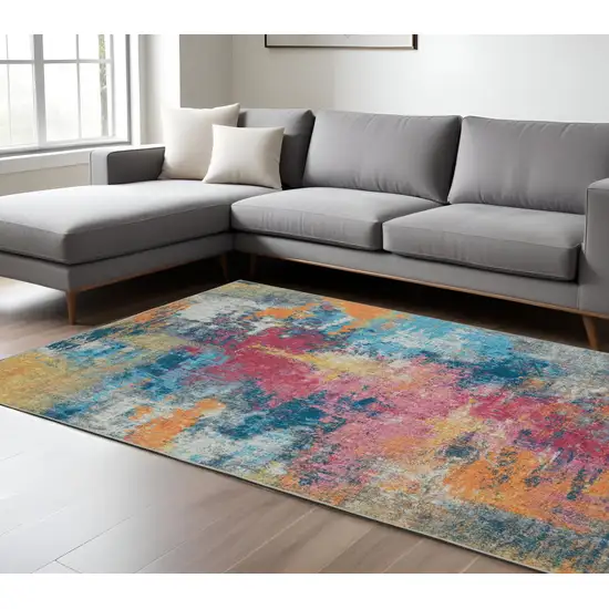 Blue Yellow And Red Abstract Distressed Area Rug Photo 1