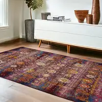 Photo of Blue Yellow And Red Floral Distressed Area Rug