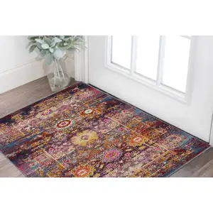 Photo of Blue Yellow And Red Floral Distressed Area Rug