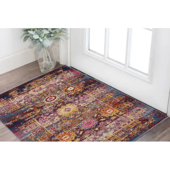 Blue Yellow And Red Floral Distressed Area Rug Photo 1