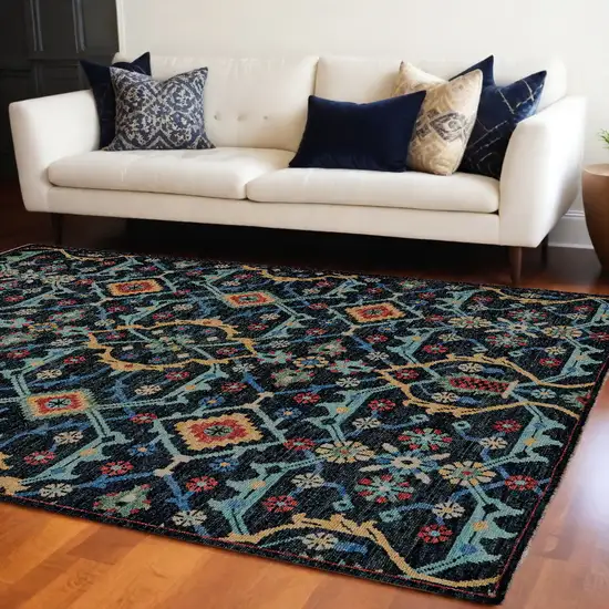 Blue Yellow And Red Wool Floral Hand Knotted Distressed Stain Resistant Area Rug With Fringe Photo 1