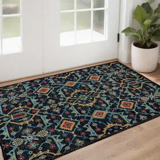 Blue Yellow And Red Wool Floral Hand Knotted Distressed Stain Resistant Area Rug With Fringe Photo 1